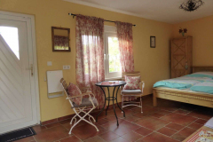 Ferienhaus "Brückenhaus Naumburg": Wohnbereich Gartenlaube
